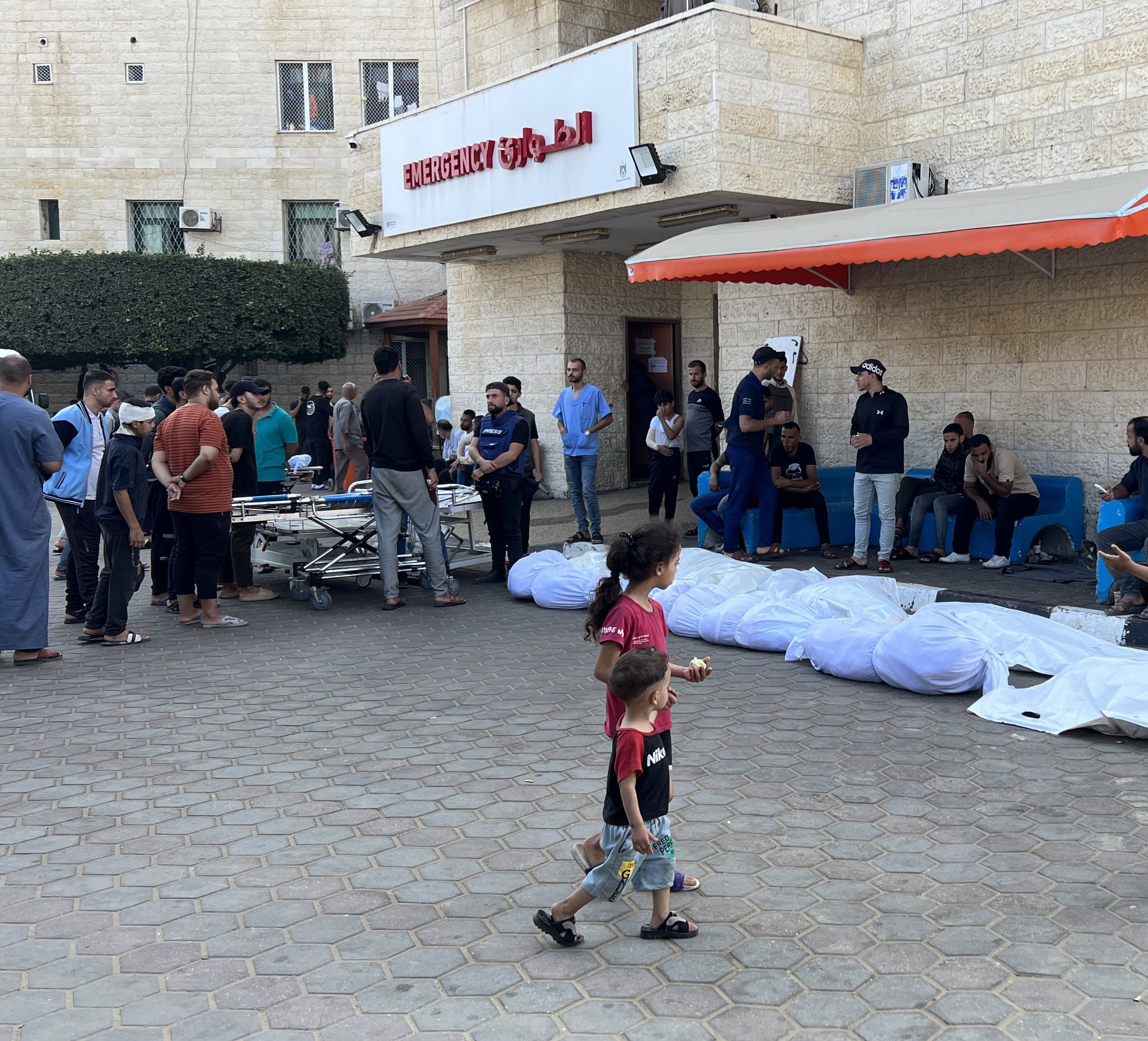 "No electricity at the morgues, bodies littered in the hospital, stench of decomposition"-  mass burials held at Gaza's Al-Shifa hospital amid rising tensions between Israel and Hamas
